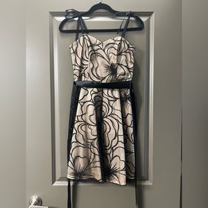 Strapless/ribbon strap tan dress with black sequence flower pattern